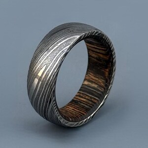 Damascus Steel Ring Whiskey Barrel Ring Wood Wedding Band Men Unique Promise Ring Wood Inlay Ring Engagement Ring Handmade Damascus Ring