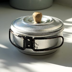 Vintage fickkruka i aluminium