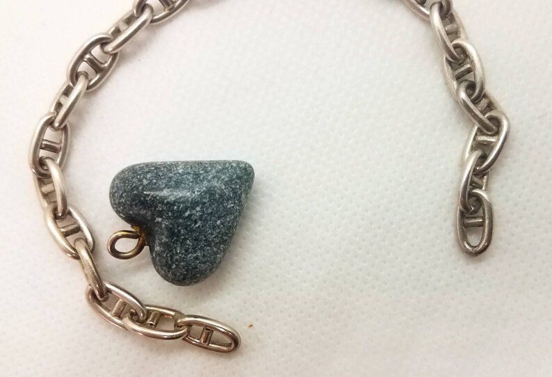 Vintage Natural Granite Stone Handcarved into a Heart pendant...it has traveled the world!