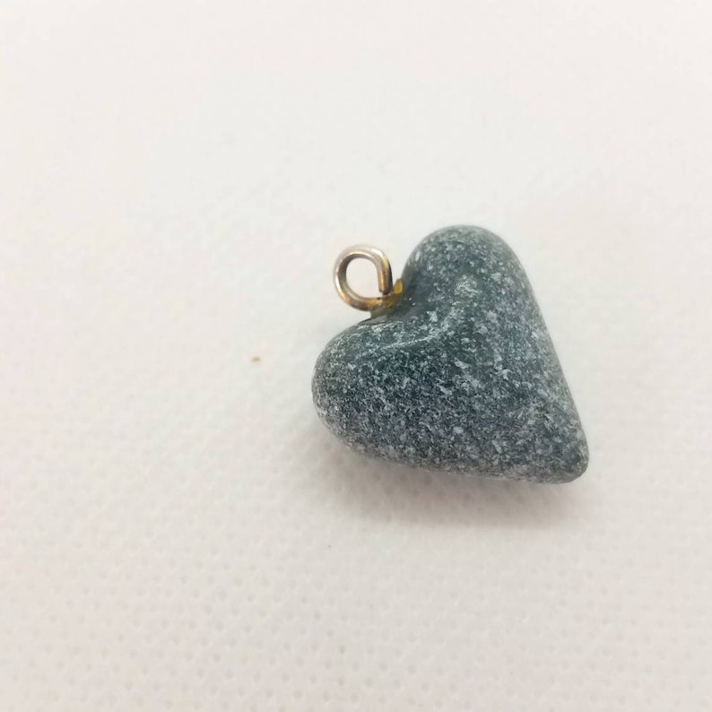 Vintage Natural Granite Stone Handcarved into a Heart pendant...it has traveled the world!