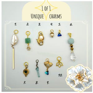 May include: A collection of ten unique charms, each with a different design. The charms include pearls, gemstones, and gold-colored metal accents. The text "1 of 1 UNIQUE CHARMS" is at the top of the image.