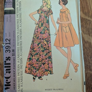 May include: A vintage McCall's 3912 sewing pattern envelope for a misses' muumuu. The front features illustrations of two dress styles: one long with a floral print and one knee-length solid orange dress with a pocket. Size small, 32 1/2-34 bust.