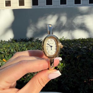 Minimalist Oval Bangle Watch, Gold Tone Roman Numeral Bracelet image 13