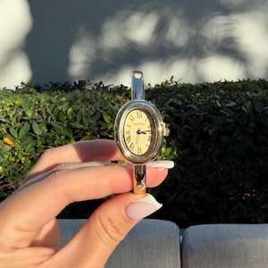 Minimalist Oval Bangle Watch, Gold Tone Roman Numeral Bracelet image 11