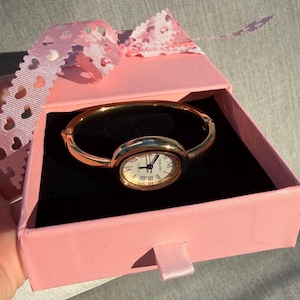 Minimalist Oval Bangle Watch, Gold Tone Roman Numeral Bracelet