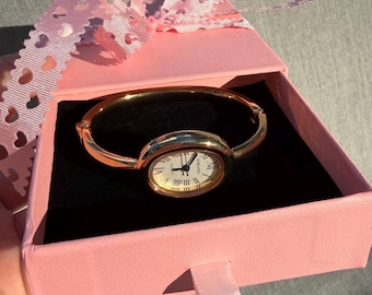 Minimalist Oval Bangle Watch, Gold Tone Roman Numeral Bracelet