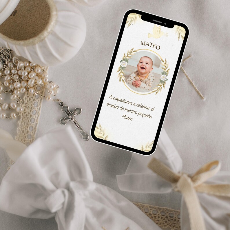 May include: A smartphone displays a baptism invitation with a photo of a baby named Mateo. The invitation is surrounded by floral and leaf accents. A rosary, a cross, and a white bow are also visible.