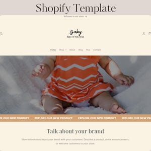 Peut inclure: Page d'accueil d'un site web pour une boutique de vêtements pour bébés et enfants appelée "Baby". La page d'accueil présente une photo d'un bébé portant une robe à motif chevron rouge et blanc. Le texte "Parlez de votre marque" est affiché sous la photo.