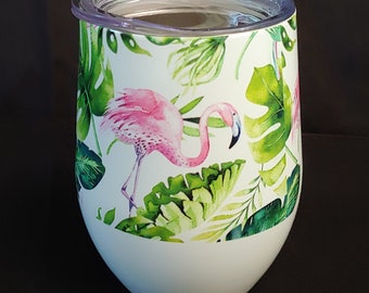 Flamingos among the tropical leaves insulated mug