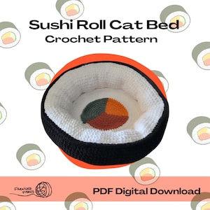 May include: A crochet cat bed resembling a sushi roll, with a black outer edge, white inner lining, and a sushi-themed centre. The image includes the text "Sushi Roll Cat Bed Crochet Pattern" and "PDF Digital Download".