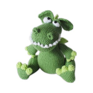 May include: A set of three ceramic mugs with a speckled, matte finish in cream, light grey, and dark grey. Each mug has a simple, minimalist design and a rounded handle.