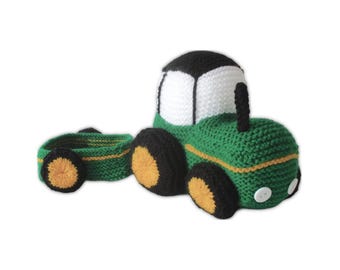 May include: A green and black crocheted tractor with a matching trailer. The tractor has yellow accents, black wheels with yellow centers, and a white cab. The trailer has similar detailing. Two white buttons are on the front of the tractor.