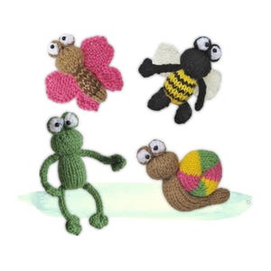 May include: Four knitted insect toys: a butterfly with pink wings, a bee with yellow and black stripes, a green frog, and a snail with a colorful shell. Each toy has large, googly eyes.