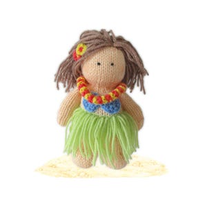 May include: A hand-knitted doll with light beige yarn skin and brown yarn hair. The doll wears a bright green yarn hula skirt, a blue yarn top, and a red and yellow yarn lei. A small yellow and red flower accessory is attached to the hair.