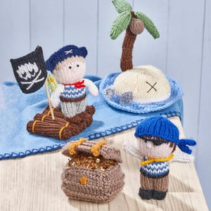 May include: Knitted pirate toys, including a pirate on a raft, a pirate with an eye patch, a treasure chest, and a palm tree on an island. The toys are made with brown, blue, white, and green yarn.