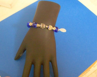 SMALL - Medium size Dressy sapphire blue and silver tone metal Bracelet  .... lovely bracelet .. stretchy