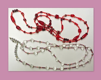 Bundle of 2 Long Hand Crafted Necklaces  .. 1 red with silver accents .. 1 with clear beads and light purple accents  ..#X20