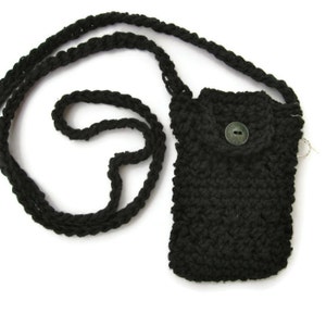 May include: A black crocheted phone pouch with a button closure and a long black crocheted strap.
