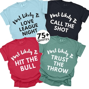 May include: Four t-shirts in chambray, red, black, and light green. Each shirt has a different white text design: "Most Likely To LOVE LEAGUE NIGHT", "Most Likely To HIT THE BULL", "Most Likely To CALL THE SHOT", and "Most Likely To TRUST THE THROW".