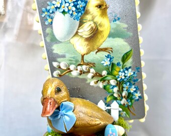 Vintage Easter postcard with a resin baby duckling atop a porcelain "forget-me-not" sugar bowl.