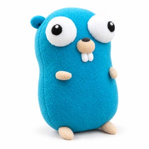 May include: A plush toy shaped like a gopher with bright blue fur, large white eyes with black pupils, a small tan nose, and two white teeth. The creature has small tan arms and feet, a rounded body, and a single small ear visible on the side.