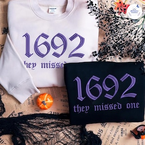 1692 They Missed One Embroidered Tone On Tone Sweatshirt, Halloween Embroidery Shirt, Salem Witch Shirt, Salem 1692 Shirt, Salem ESS511.H.C