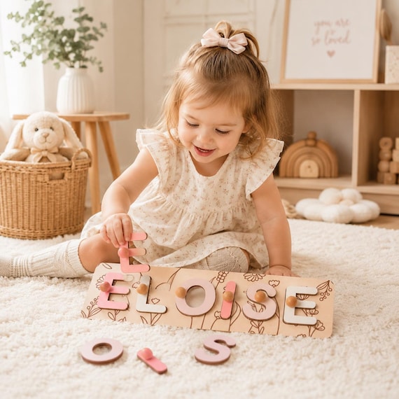 Floral Montessori wooden name puzzle with 1,190 favorites — a rare case where real demand proves this maker's design stands out in a crowded category.