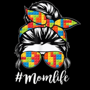 May include: A graphic illustration on a black background features a woman's silhouette with a messy bun and sunglasses. The sunglasses and headscarf are patterned with colorful toy bricks. The text "#Momlife" is written in white cursive.