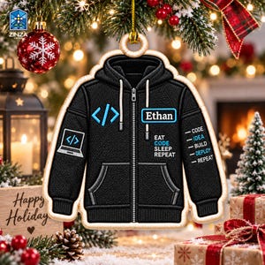 Puede incluir: Un adorno de sudadera con capucha negra y cremallera que presenta un símbolo de corchete de código azul claro, un icono de portátil y el nombre Ethan. El texto dice EAT CODE SLEEP REPEAT y una lista: CODE, IDEA, BUILD, DEPLOY, REPEAT.