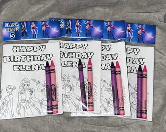 May include: A set of birthday party favors featuring coloring books and crayons. Each coloring book has the text "HAPPY BIRTHDAY ELENA" and a black and white illustration. Crayons are black, purple, and pink. Small cards read "ELENA TURNS 5".