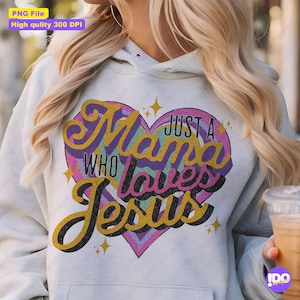 May include: A white hoodie with a colourful heart design that says "Just a Mama Who Loves Jesus".