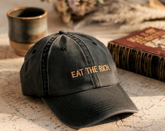Geborduurde katoenen 'Eat the Rich'-pet, minimalistische linkse hoed