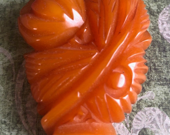 1930/'s Butterscotch Carved Bakelite Floral Dress Clip