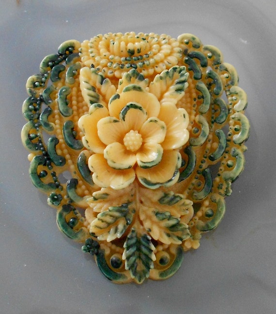 Ivory and Green Colored Floral Celluloid Pin - image 1