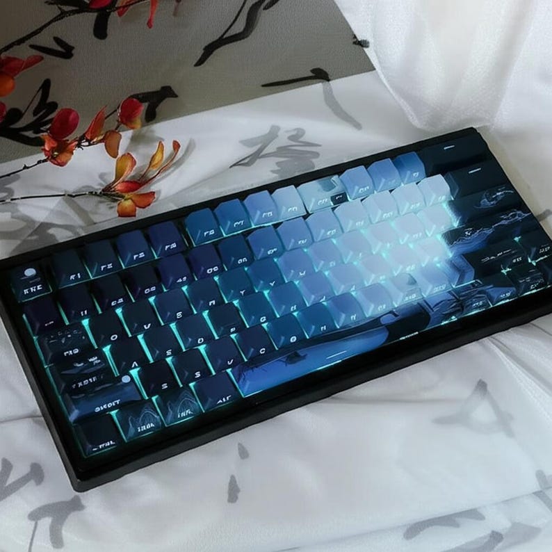 May include: A black mechanical keyboard with blue and white keycaps. The keycaps have a gradient effect, fading from dark blue to light blue. The keyboard has a black frame and a black cable.