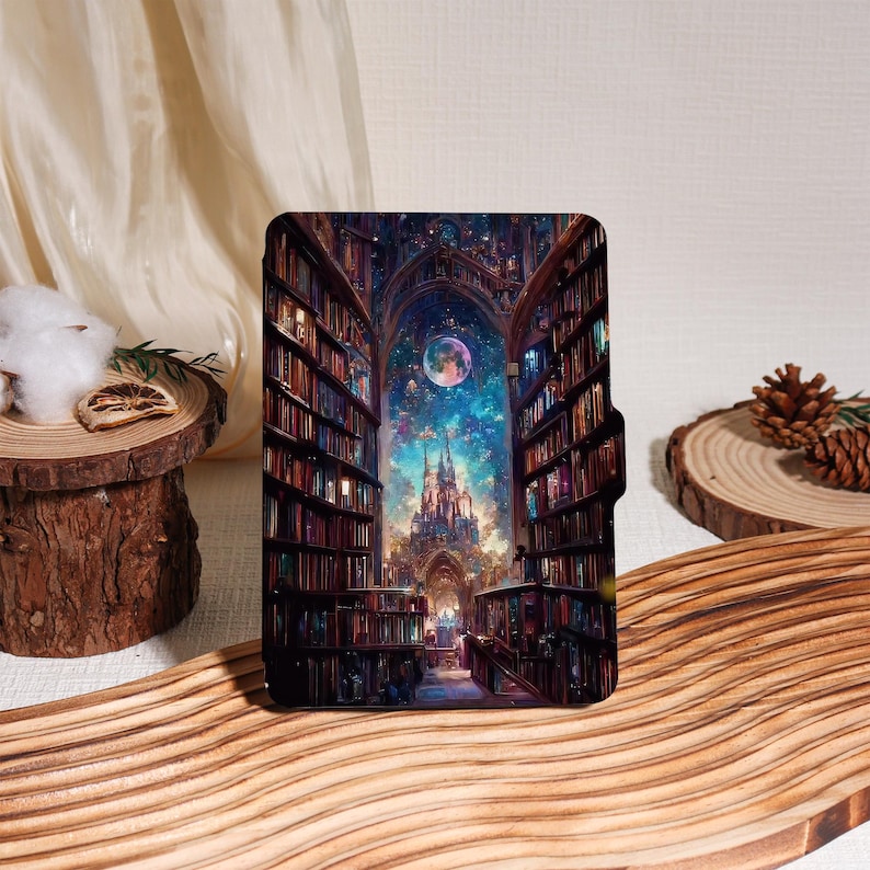 May include: A black tablet case featuring a fantasy library scene with bookshelves, a castle, and a celestial sky. The case is open, revealing the detailed artwork. The overall theme is fantasy and literature.