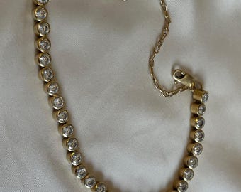 18 K gold and zircon Tennis bracelet