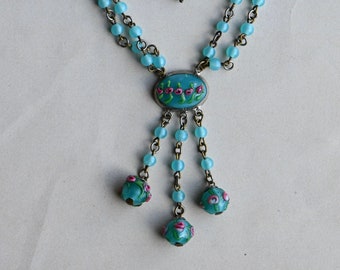 Vintage 1930s blue and rosette art glass bead necklace with tassel and swag