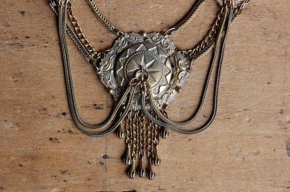 Antique 1930s ornate cast brass festoon necklace