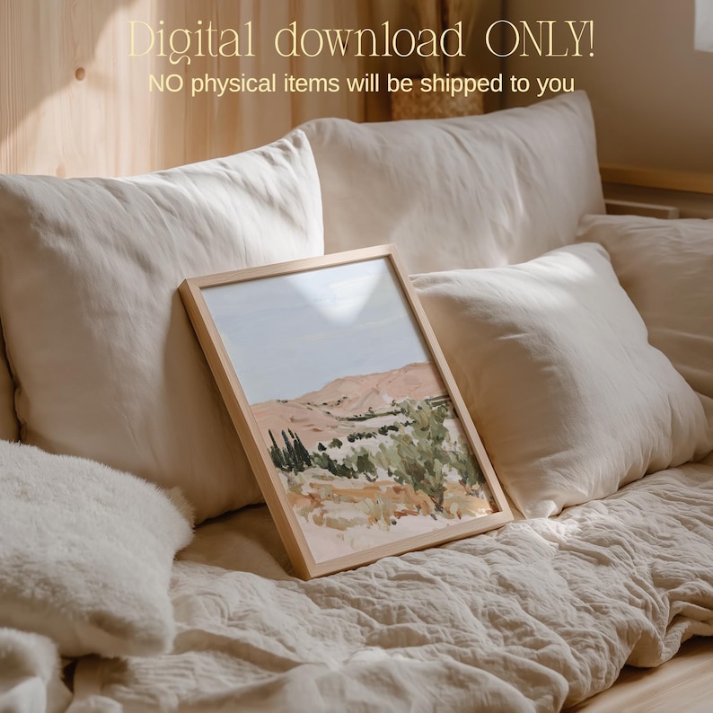 May include: A framed landscape art print featuring a desert scene with mountains, trees, and a blue sky. The artwork is in a light wooden frame. The text "Digital download ONLY! NO physical items will be shipped to you" is at the top.