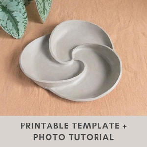 May include: A light gray, three-sectioned concrete dish with a swirling design. The dish is on a light brown surface. The text "PRINTABLE TEMPLATE + PHOTO TUTORIAL" is at the bottom of the image.