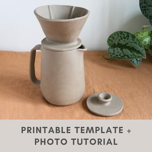 May include: A beige ceramic pour-over coffee maker with a matching lid. The coffee maker has a handle and a cone-shaped filter holder. The text "PRINTABLE TEMPLATE + PHOTO TUTORIAL" is at the bottom of the image.