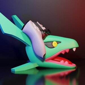 May include: A 3D-rendered sculpture of a teal dragon head with a pink and red open mouth, white teeth, and yellow eyes. A white and black controller is placed on the dragon's head. The background is a gradient of red and blue.