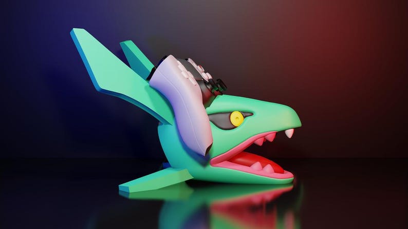 May include: A 3D-rendered sculpture of a teal dragon head with a pink and red open mouth, white teeth, and yellow eyes. A white and black controller is placed on the dragon's head. The background is a gradient of red and blue.