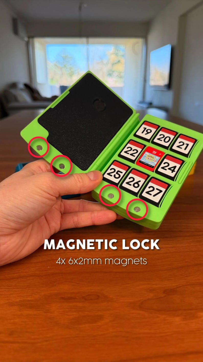 May include: A green magnetic lock case with a black interior and a series of numbered compartments. The case is open, revealing the interior and the magnetic closures. The text "MAGNETIC LOCK" and "4x 6x2mm magnets" are displayed.
