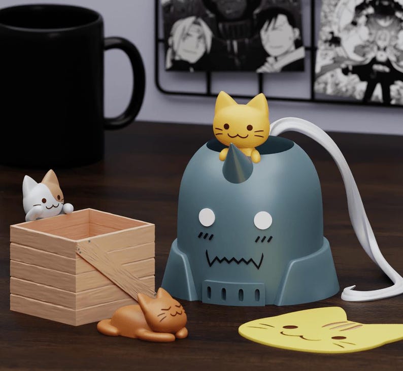 May include: A blue and gray figurine of a robot with a cat head, with a yellow cat figurine sitting on top. There are three other cat figurines, one white and two brown, on a wooden surface.