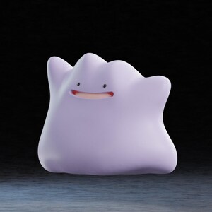 May include: A light purple, blob-shaped figure with a smiling face. The figure has a smooth texture and a simple design, with small black dots for eyes and a red mouth. The overall shape is rounded and symmetrical, with a slightly uneven top.