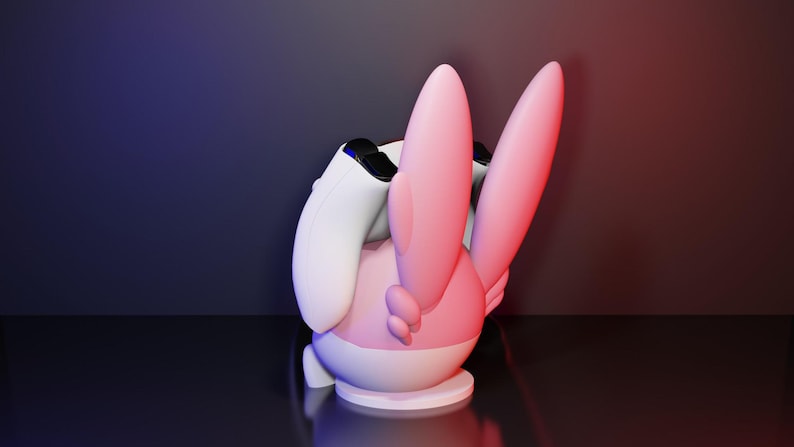 May include: A pink and white cartoon character with large ears and a round body. The character is holding a white game controller. The background is a gradient of blue and red.