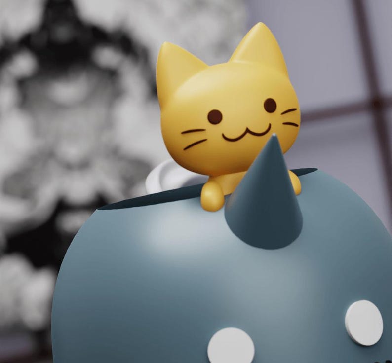 May include: A blue ceramic unicorn figurine with a yellow cat figurine sitting on its horn. The cat has a smiling face and brown eyes.