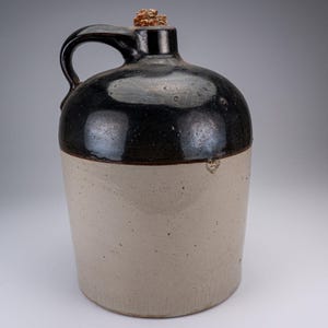 Antique Two-Tone Stoneware Whiskey Jug Crock with Loop Handle and Corn Stopper